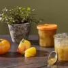 Pot en verre avec couvercle orange