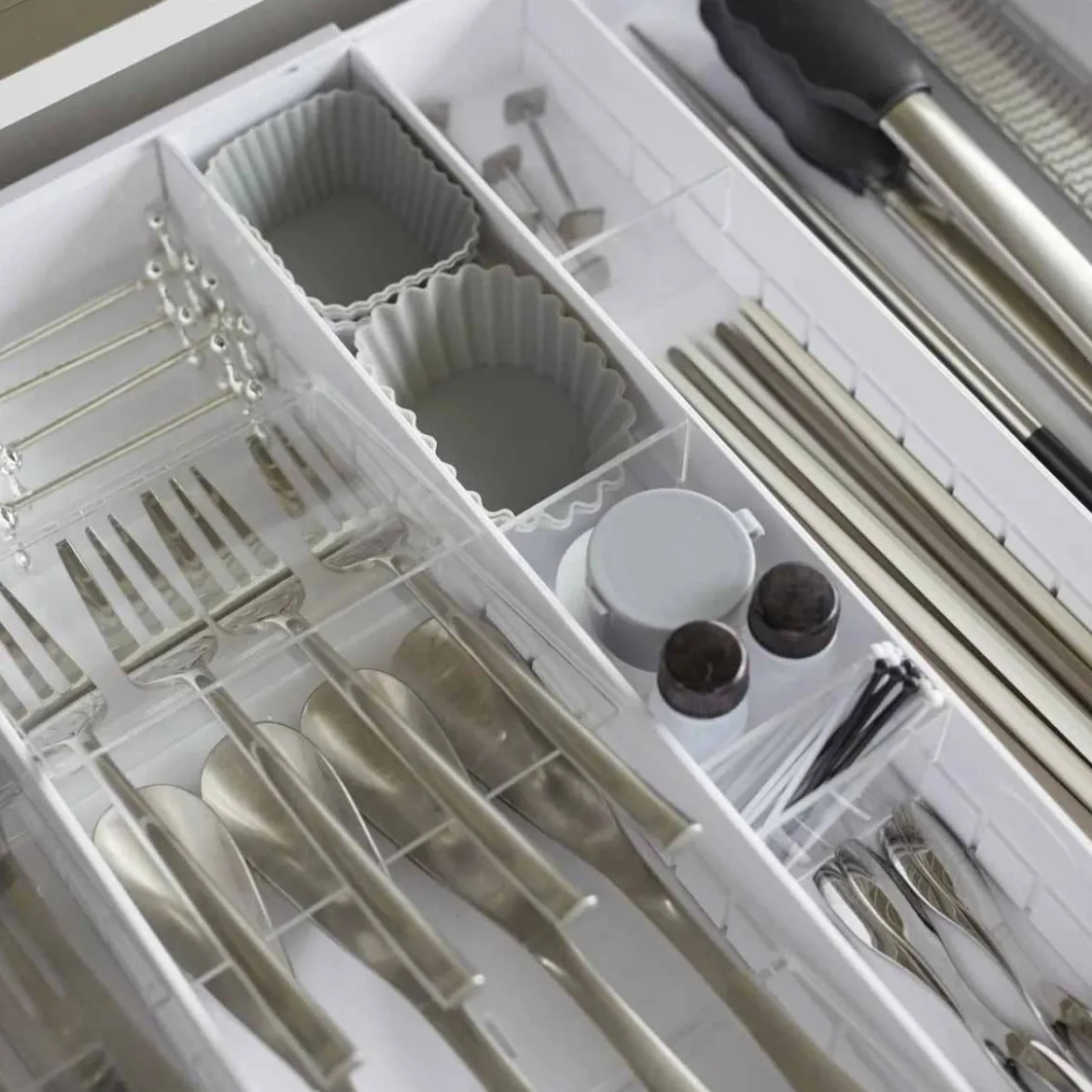 Range-couverts extensible gain de place