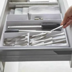 Range-couverts extensible gain de place