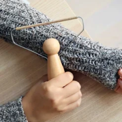 Rasoir anti bouloches et poils pour vêtements